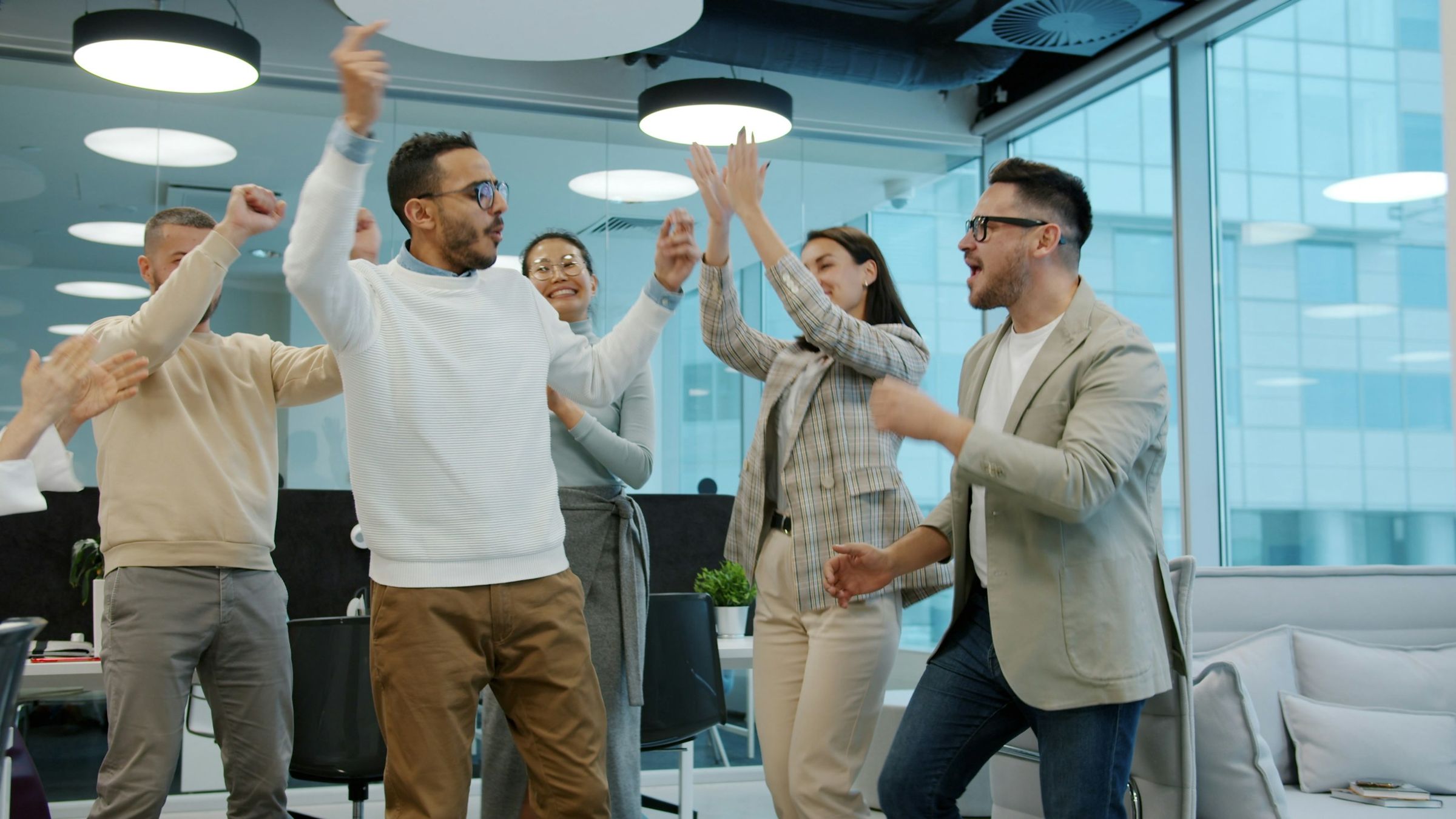 The Point One Zero team celebrating together
